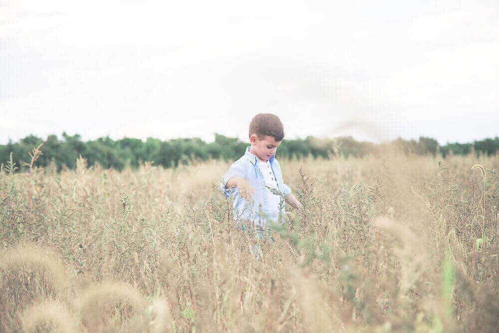 Kid walking in the fields