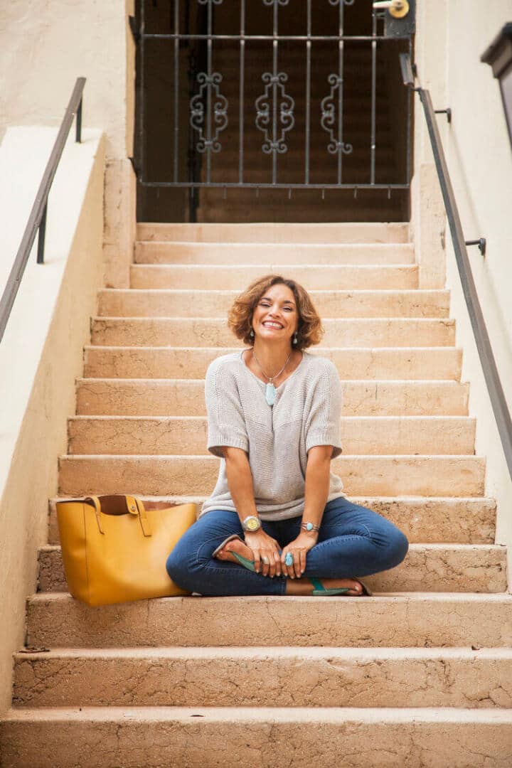woman sitting at stairs for photoshoot