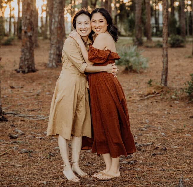 Sisters posing during a lovely Family Photoshoot in the Woods
